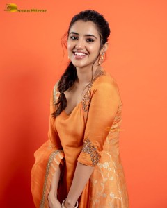 Actress Malvika Sharma in a orange salwar dress
