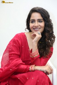actress Malvi Malhotra cute photoshoot in a red salwar