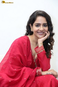 actress Malvi Malhotra cute photoshoot in a red salwar