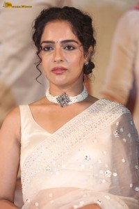 actress Malvi Malhotra beautiful in a white saree at a movie function