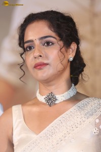actress Malvi Malhotra beautiful in a white saree at a movie function