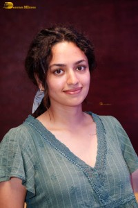 actress malvika nair photoshoot in a green top