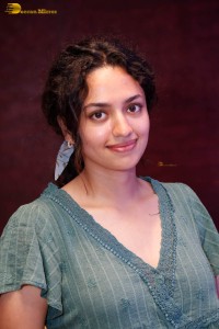 actress malvika nair photoshoot in a green top