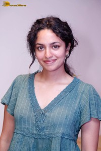 actress malvika nair photoshoot in a green top