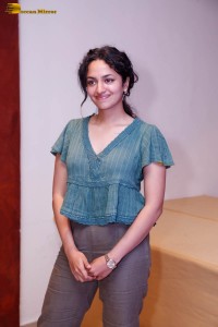 actress malvika nair photoshoot in a green top
