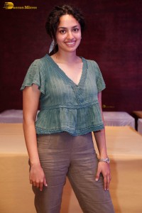 actress malvika nair photoshoot in a green top