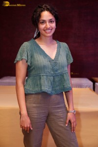 actress malvika nair photoshoot in a green top