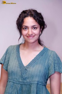 actress malvika nair photoshoot in a green top