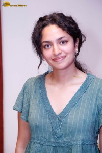 actress malvika nair photoshoot in a green top