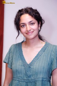 actress malvika nair photoshoot in a green top