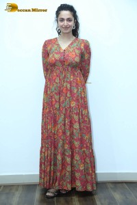 Actress malvika nair in a red colorful dress looking cute