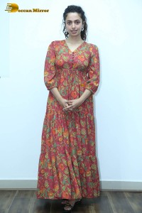 Actress malvika nair in a red colorful dress looking cute