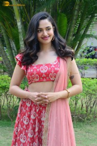 south actress malvika nair in a red lehenga choli