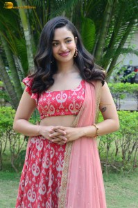 south actress malvika nair in a red lehenga choli