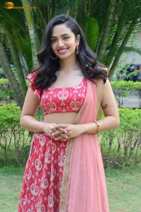 south actress malvika nair in a red lehenga choli