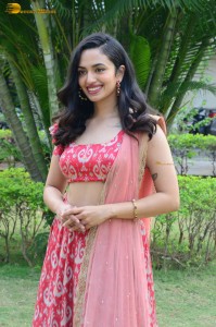 south actress malvika nair in a red lehenga choli
