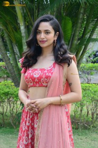 south actress malvika nair in a red lehenga choli