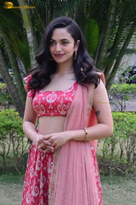 south actress malvika nair in a red lehenga choli