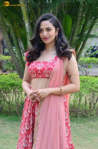 south actress malvika nair in a red lehenga choli