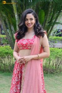 south actress malvika nair in a red lehenga choli
