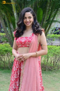south actress malvika nair in a red lehenga choli