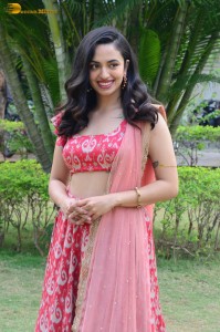 south actress malvika nair in a red lehenga choli
