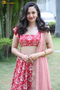 south actress malvika nair in a red lehenga choli