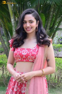 south actress malvika nair in a red lehenga choli