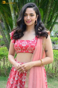 south actress malvika nair in a red lehenga choli