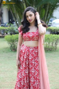 south actress malvika nair in a red lehenga choli