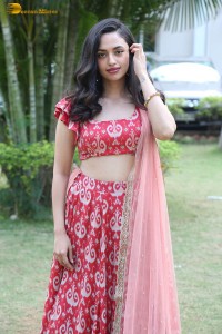 south actress malvika nair in a red lehenga choli