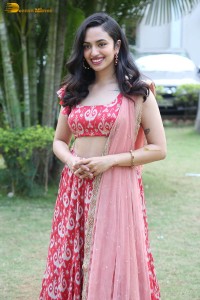 south actress malvika nair in a red lehenga choli