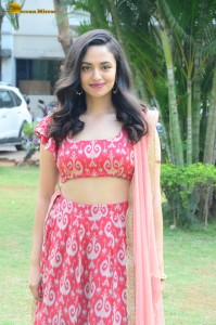 south actress malvika nair in a red lehenga choli