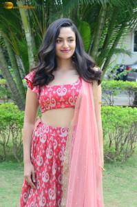 south actress malvika nair in a red lehenga choli