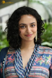 Actress malvika nair photoshoot in salwar dress and curly hair