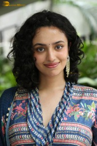 Actress malvika nair photoshoot in salwar dress and curly hair