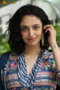 Actress malvika nair photoshoot in salwar dress and curly hair