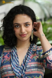 Actress malvika nair photoshoot in salwar dress and curly hair