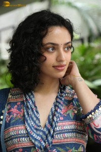 Actress malvika nair photoshoot in salwar dress and curly hair