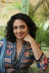 Actress malvika nair photoshoot in salwar dress and curly hair