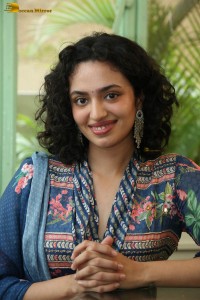 Actress malvika nair photoshoot in salwar dress and curly hair