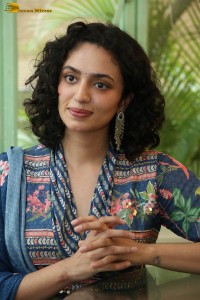 Actress malvika nair photoshoot in salwar dress and curly hair