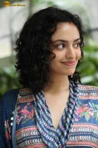 Actress malvika nair photoshoot in salwar dress and curly hair