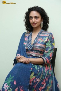 Actress malvika nair photoshoot in salwar dress and curly hair