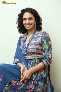 Actress malvika nair photoshoot in salwar dress and curly hair