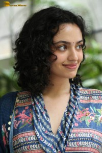 Actress malvika nair photoshoot in salwar dress and curly hair