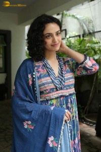 Actress malvika nair photoshoot in salwar dress and curly hair