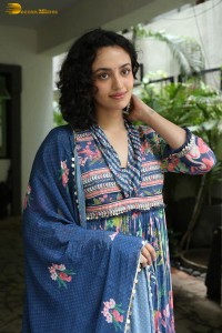 Actress malvika nair photoshoot in salwar dress and curly hair