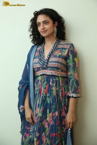 Actress malvika nair photoshoot in salwar dress and curly hair