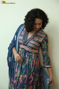 Actress malvika nair photoshoot in salwar dress and curly hair